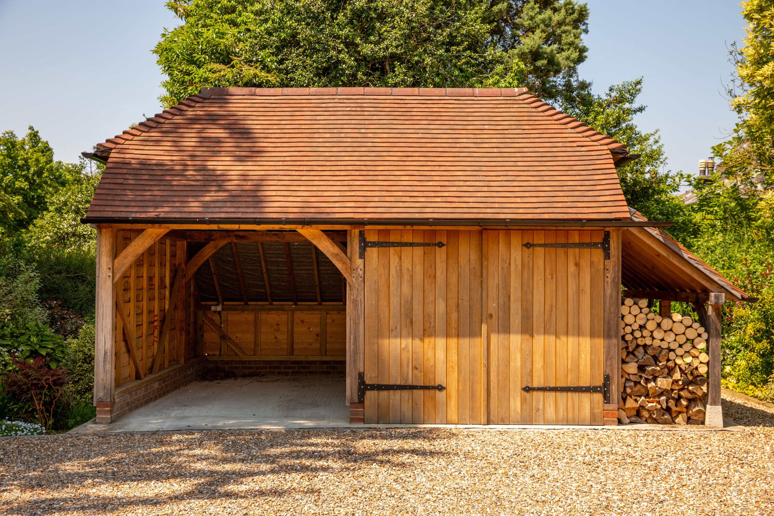 2 bay oak garage with log store Round Wood