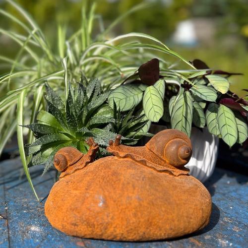 Cast Iron Snails on a Rock