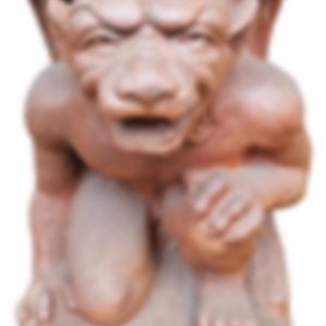 Cast Iron Kneeling Monster Statue