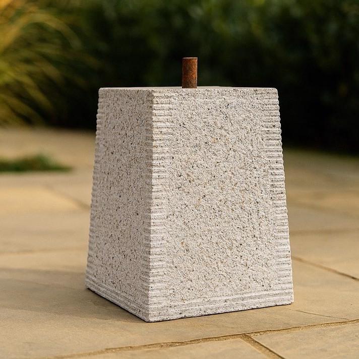 Granite, tapered square, staddle stone with steel pin